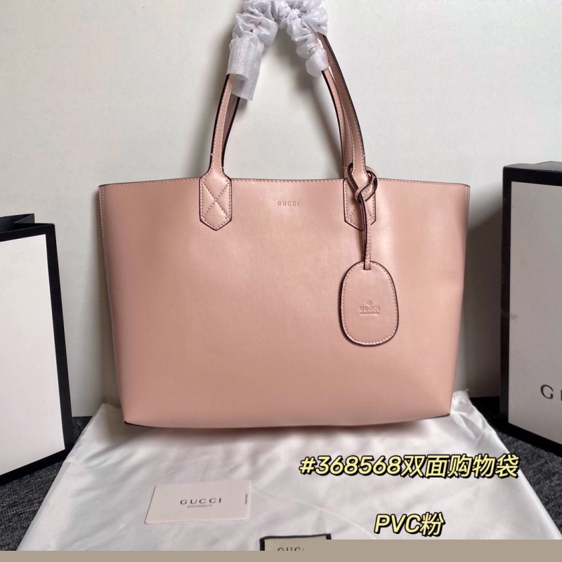 G*u*i shopping bags